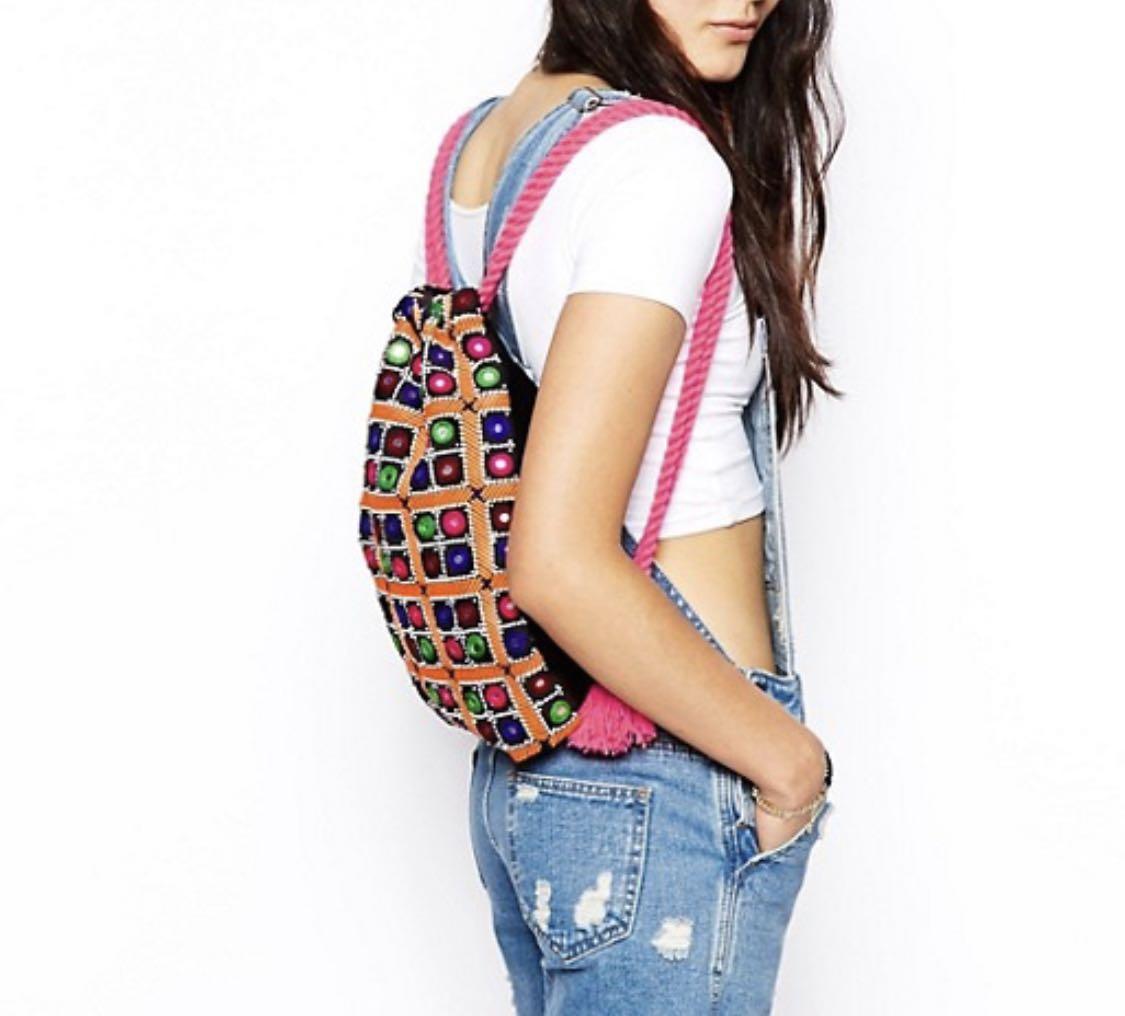 Drawstring Backpack with Sequin Work (Category: Purses & Pouches) located in Kuala Lumpur. Submitted by honey_combie (Listing ID 1024470338, Image 1). Description: A drawstring backpack with detailed sequin work, one side cute pom pom - Material: 100% cotton - Multi-colour - New without tag, never been used Has been kept for awhile, selling as never had the chance to use it. .
