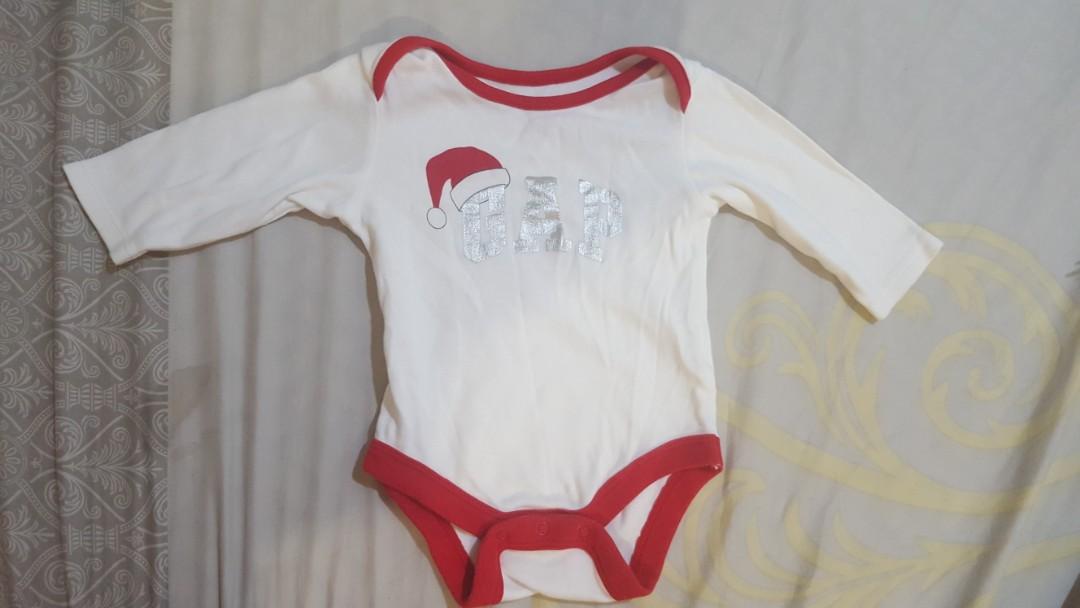 Gap Christmas Onesie (Category: Babies & Kids Fashion) located in Cainta. Submitted by jgbags (Listing ID 1024519490, Image 1). Description: guc fits 1-3M.