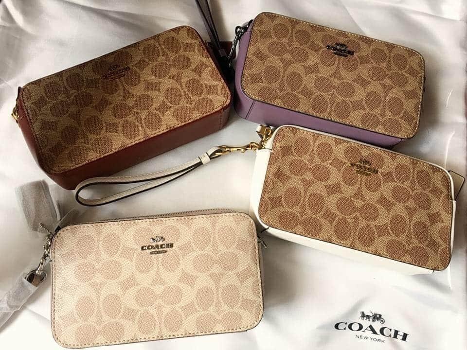 Sale! Authentic coach double zip sling bag, Luxury, Bags & Wallets, Sling Bags on Carousell