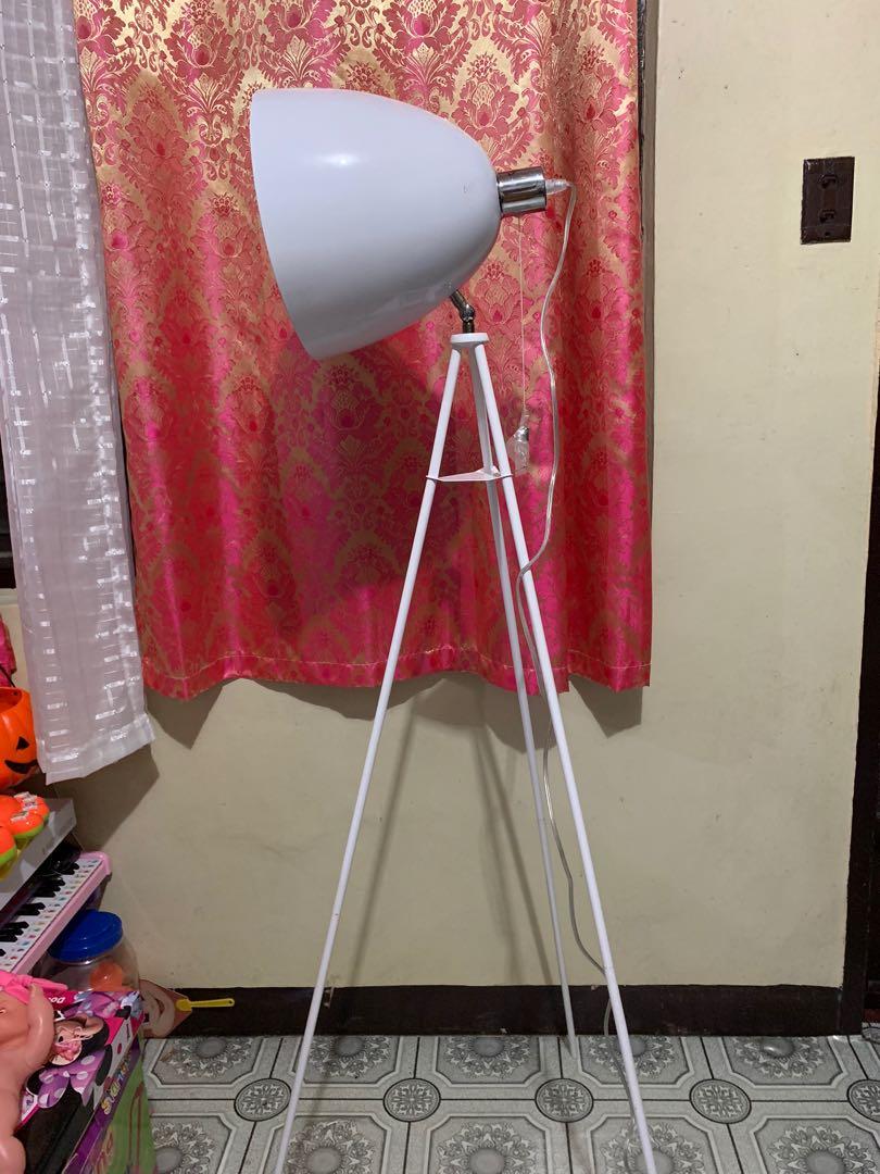 red tripod floor lamp