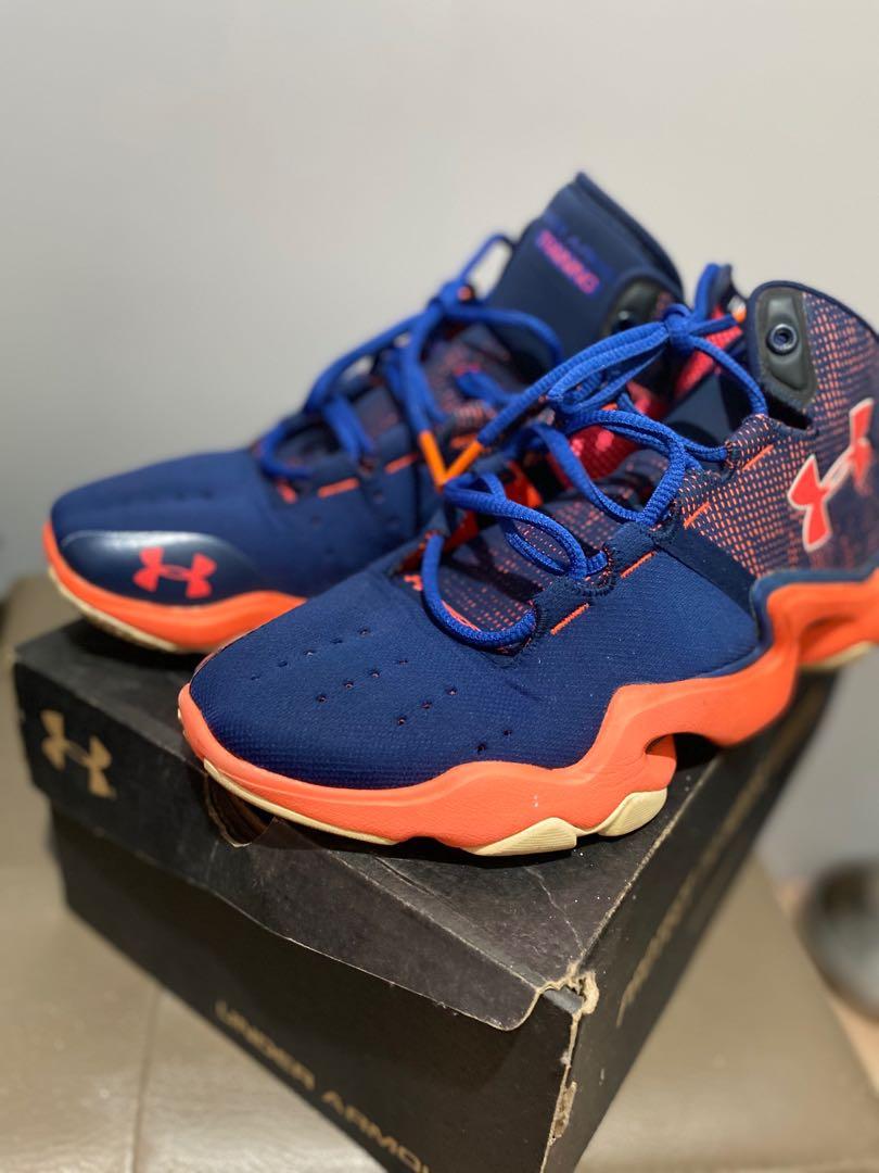 orange and blue gym shoes