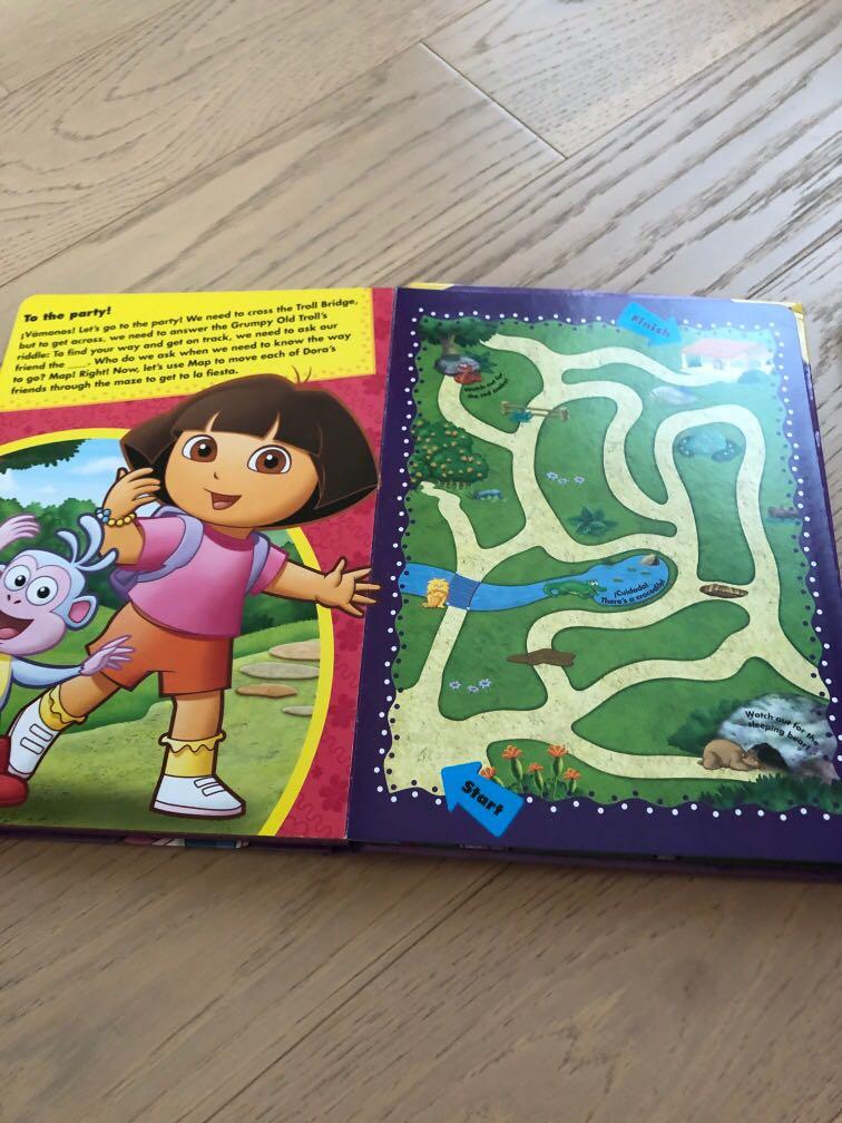 7 Dora books. 1 big A4 bubble magnet book. And 6 hard board story ...
