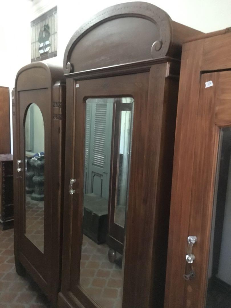 Antique Narra Aparadors (Category: Shelves, Cabinets & Racks) located in San Juan City. Submitted by ethannate (Listing ID 1017910019, Image 2). Description: Assorted Solid Narra Aparadors Cabinets 1930s-50s 1. 2 Door Narra aparador with mirror and carvings with arch shape crown 2. Top Crown Carving 2 door French Door Clear Glass Curio Cabinet w/ Blue Glass Knobs with large drawer below 3. Antique Narra Glass Display Cabinet w/ crown carvings and