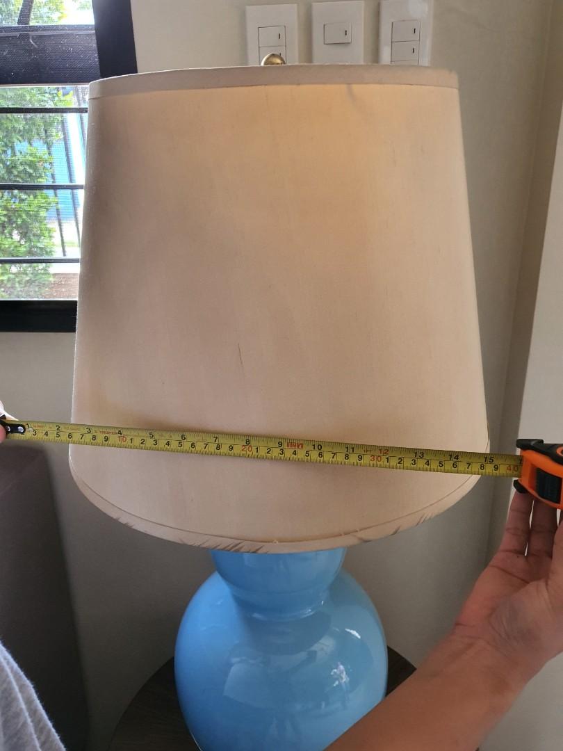 Ceramic table lamps (Category: Lighting) located in Marikina City. Submitted by twinkletosh14 (Listing ID 1017892927, Image 2). Description: used blue ceramic lamp 3k each 2 pcs available.