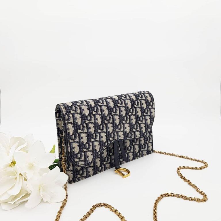 Dior saddle best sale wallet price singapore