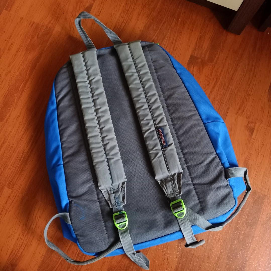 JanSport Digibreak Backpack (Category: Backpacks) located in Pasig City. Submitted by kanello (Listing ID 1017980841, Image 2). Description: JanSport Digibreak Backpack 💯 authentic, preloved, stored properly Color: Blue Streak/Neon Green Includes: - 15-inch laptop sleeve - padded backing & base - padded tablet pocket (seen in pic, yung white) - phone pocket Flaws: (see pics) - sira yung malaking zipper - may blue stain sa left strap - may stain 
