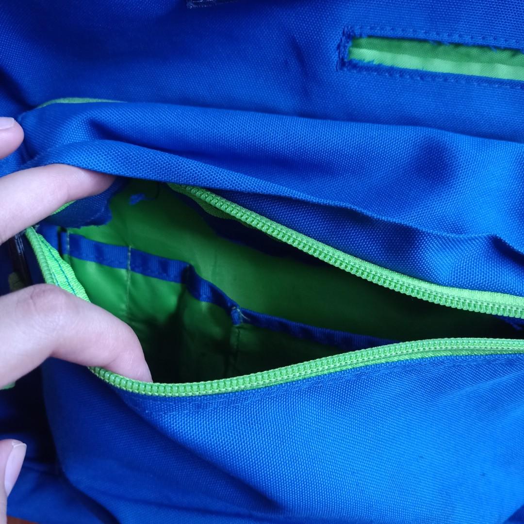 JanSport Digibreak Backpack (Category: Backpacks) located in Pasig City. Submitted by kanello (Listing ID 1017980841, Image 3). Description: JanSport Digibreak Backpack 💯 authentic, preloved, stored properly Color: Blue Streak/Neon Green Includes: - 15-inch laptop sleeve - padded backing & base - padded tablet pocket (seen in pic, yung white) - phone pocket Flaws: (see pics) - sira yung malaking zipper - may blue stain sa left strap - may stain 