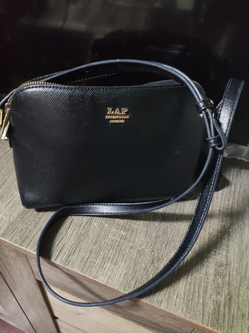 Lap sling outlet bag