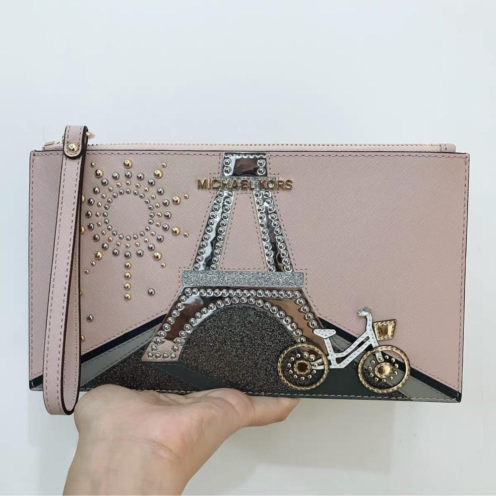 silver clutch bag with wrist strap