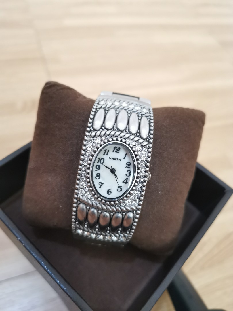 Narmi stainless steel back discount watch