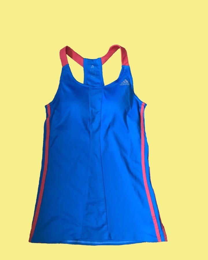 Adidas 2-in-1 tank (Category: Activewear) located in Pasay City. Submitted by v_nav (Listing ID 1024631156, Image 1). Description: With built-in sports bra Size small.