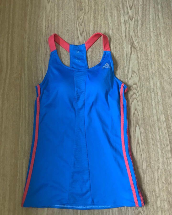 Adidas 2-in-1 tank (Category: Activewear) located in Pasay City. Submitted by v_nav (Listing ID 1024631156, Image 2). Description: With built-in sports bra Size small.
