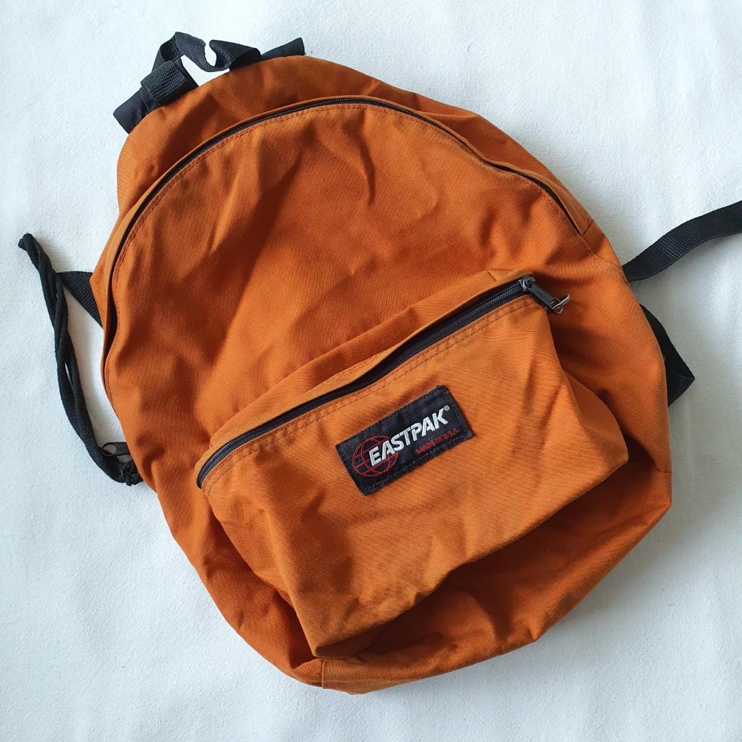 orange eastpak backpack