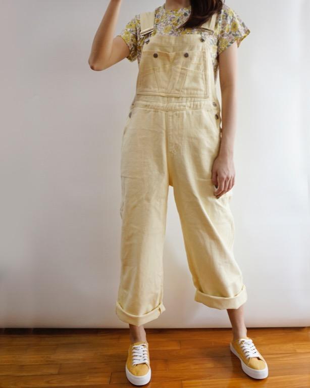 yellow baggy overalls