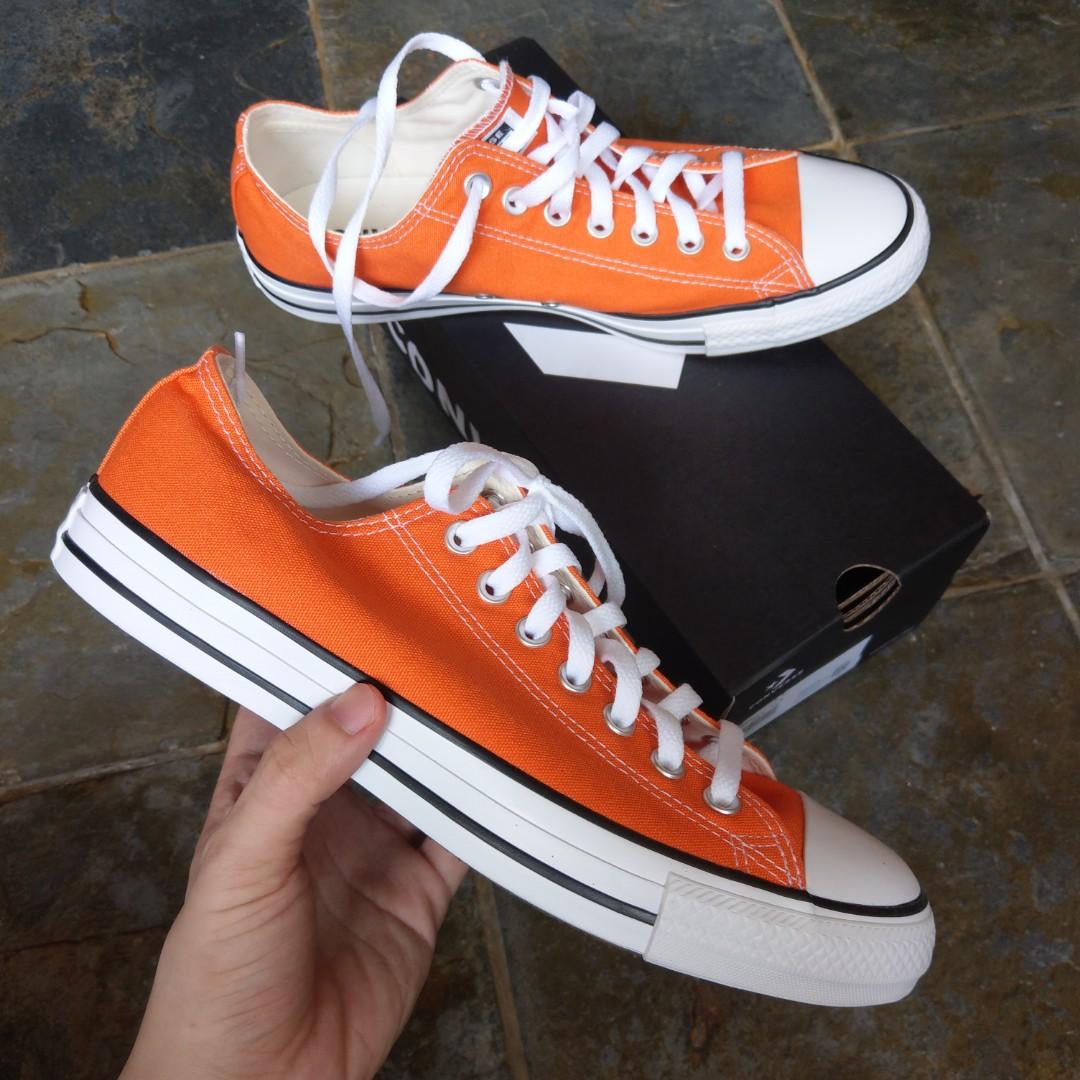 orange converse tennis shoes