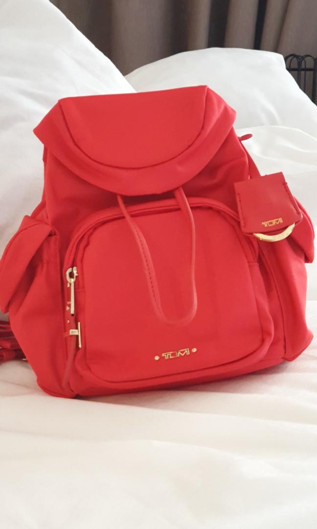 tumi backpack women price