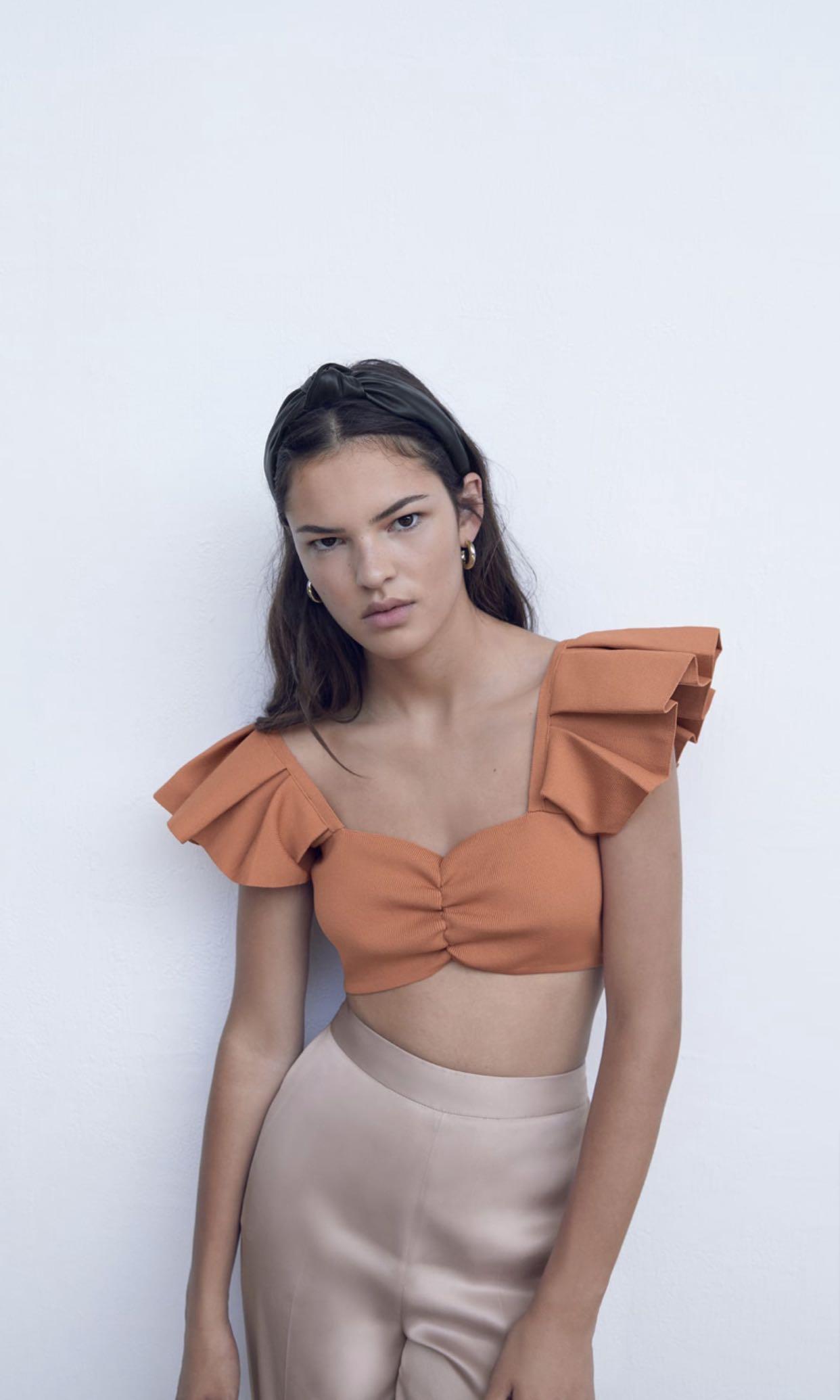 BNWT Zara ruffled knit top (Category: Sleeveless) located in Makati City. Submitted by madclutter (Listing ID 1024813303, Image 1). Description: .