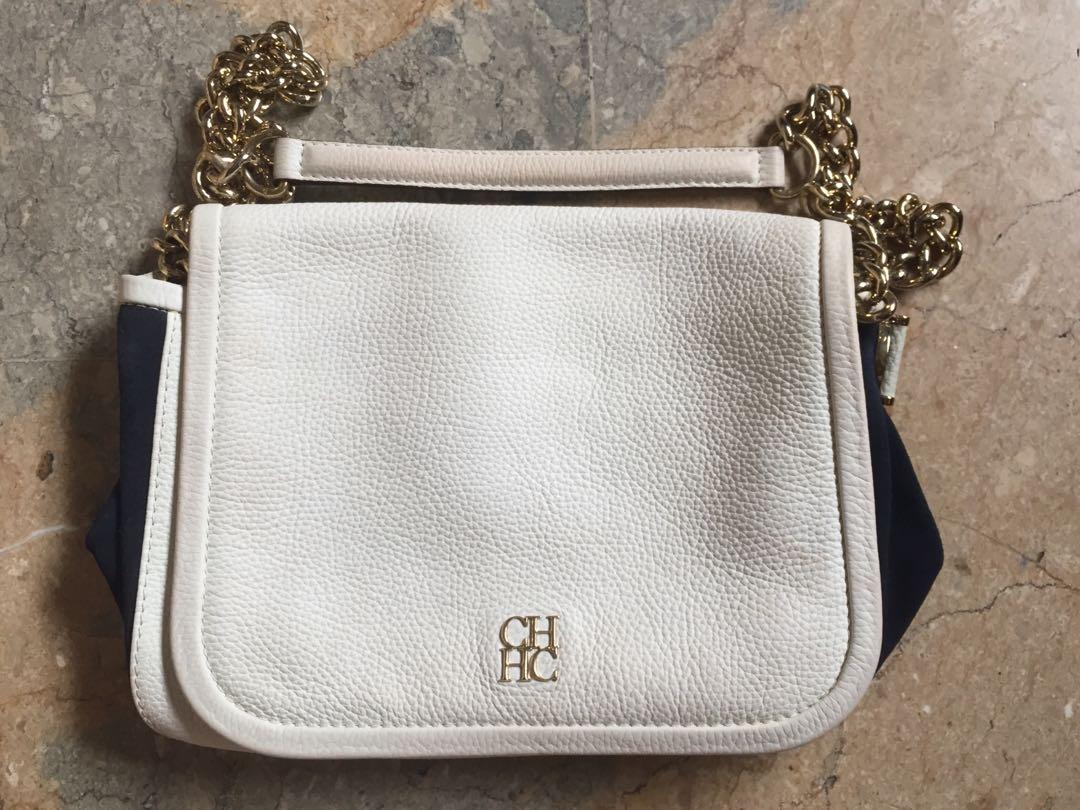 Carolina Herrera bicolor sling (Category: Luxury Bags & Wallets) located in Legazpi City. Submitted by brandedstuffphl (Listing ID 1025040593, Image 1). Description: Authentic, preloved Made in Spain Very good condition.