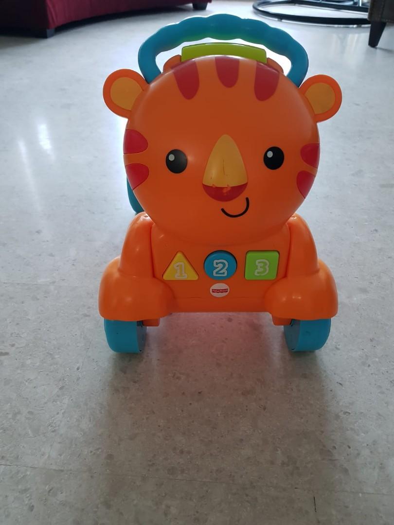 fisher price lion walker and ride on