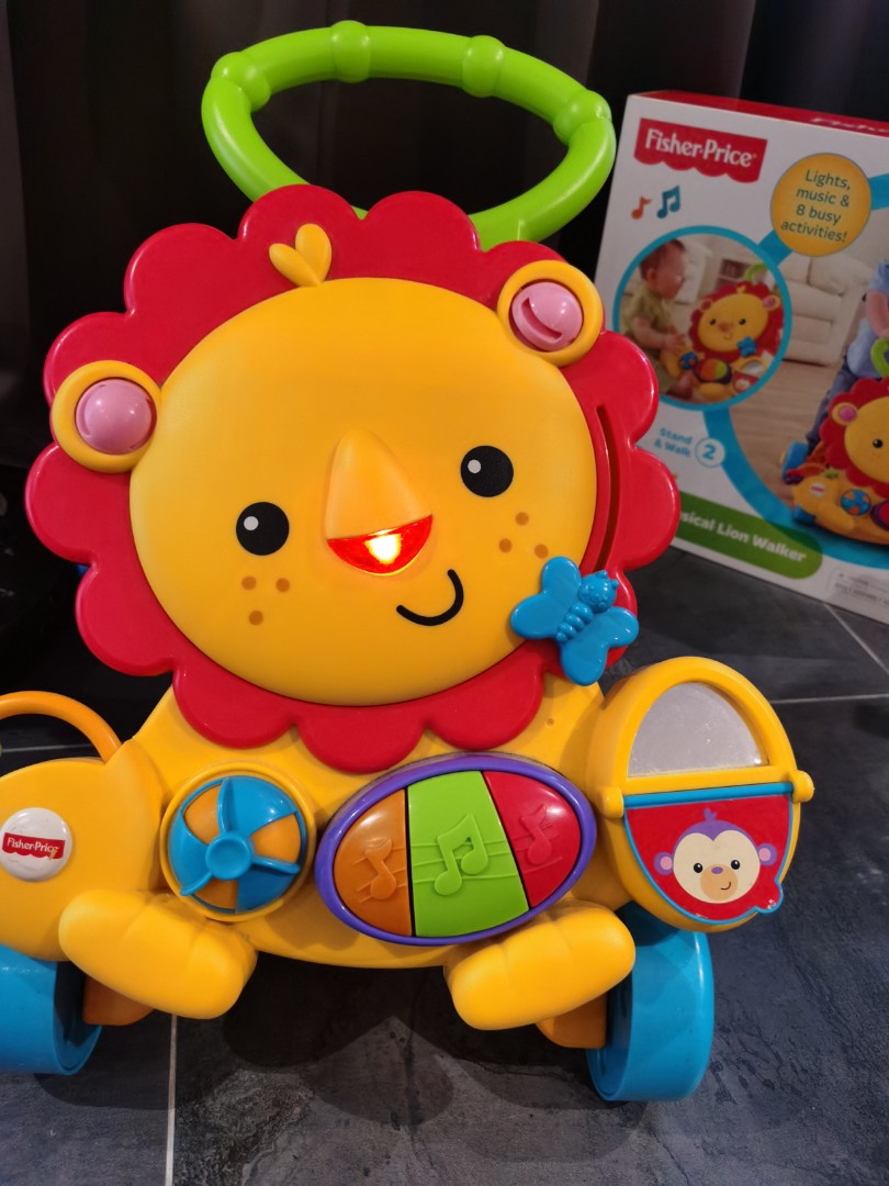 harga fisher price musical lion walker