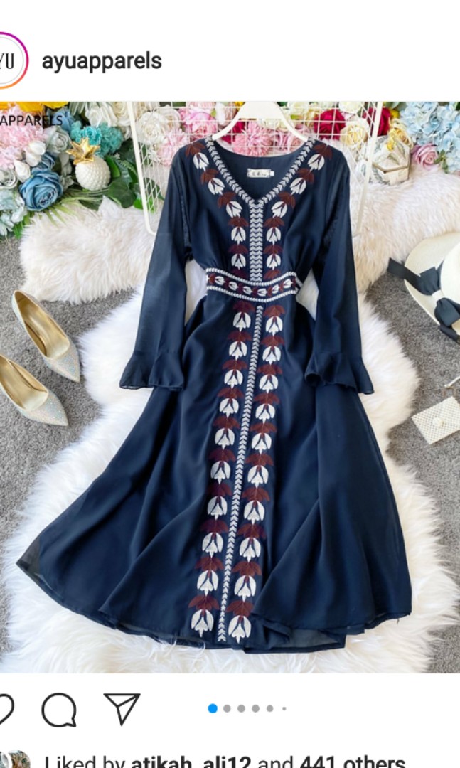 blue embroidered gown