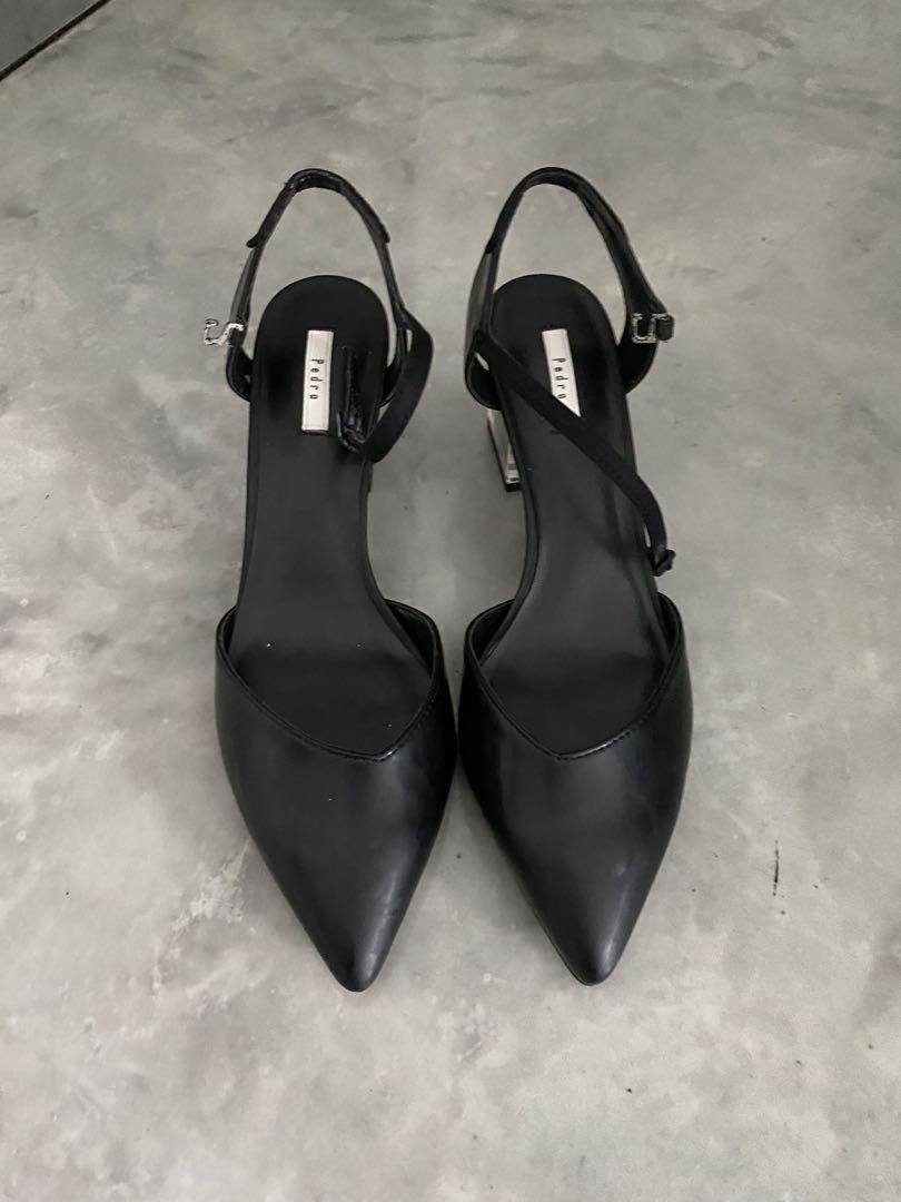 black shoes with glass heels