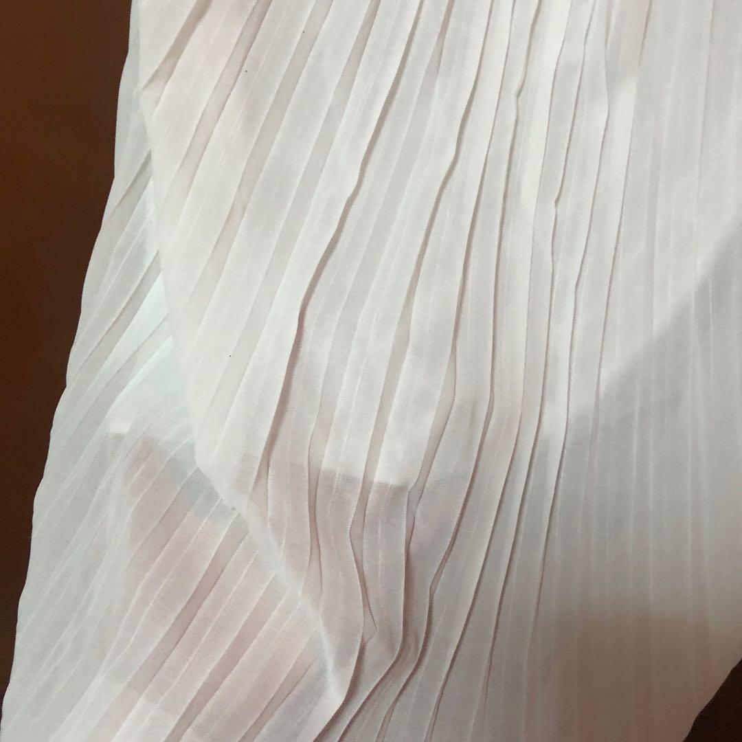 Sheer White Pleated Skirt (Category: Skirts) located in Manila. Submitted by declutter_manila (Listing ID 1024951159, Image 3). Description: Sheer Pleated Garterized With 2nd layer so legs aren’t see through .