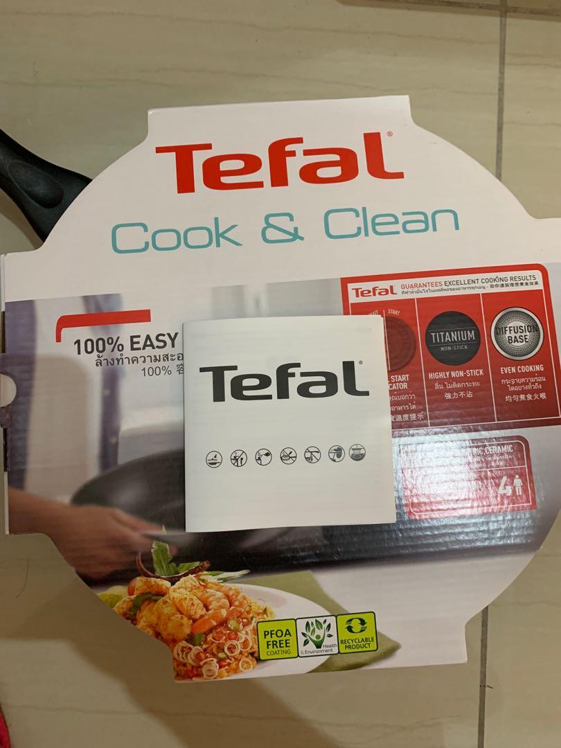 https://media.karousell.com/media/photos/products/2020/7/31/tefal_extra_cook_and_clean_wok_1596206949_908ea720_progressive.jpg