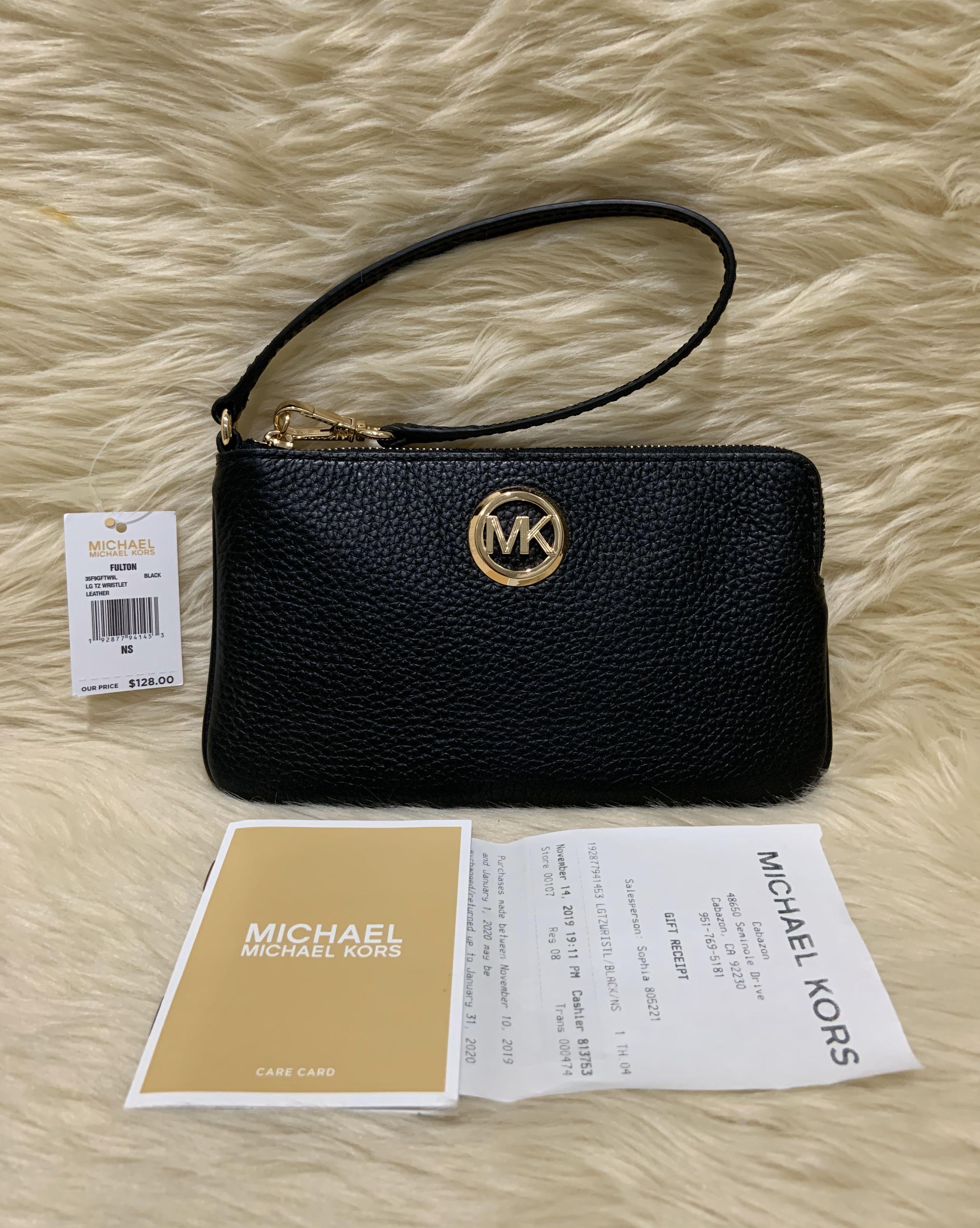 ?% Authentic Michael Kors Wristlet, Women's Fashion, Bags & Wallets,  Wallets & Card holders on Carousell