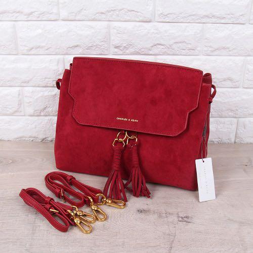 Tassel detail online front flap backpack