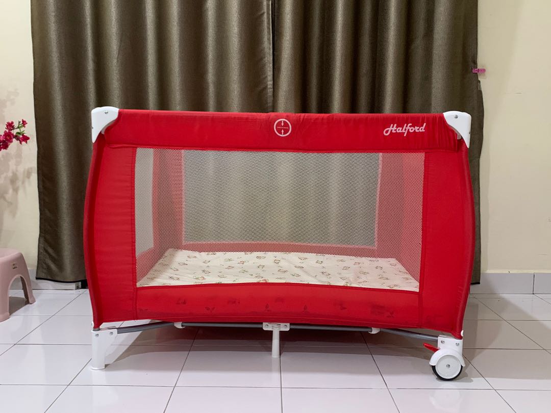 Halfords store travel cot