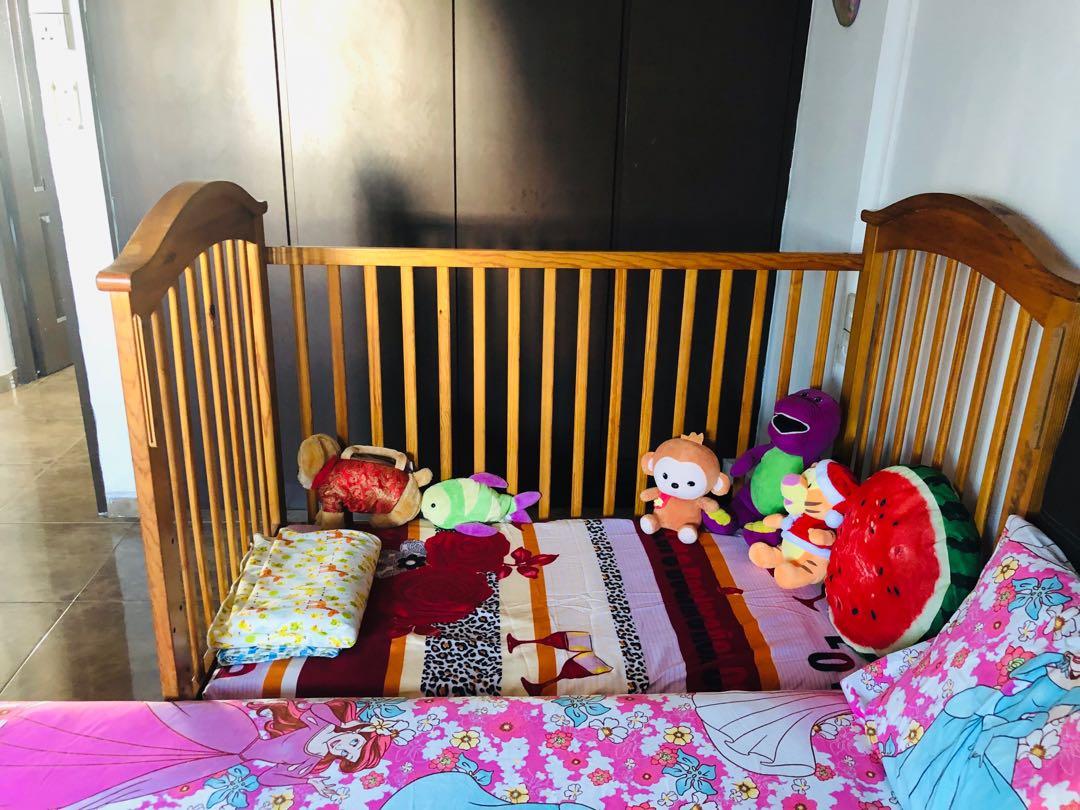 Solid wood baby cot convertible to toddler bed with mattress., Babies