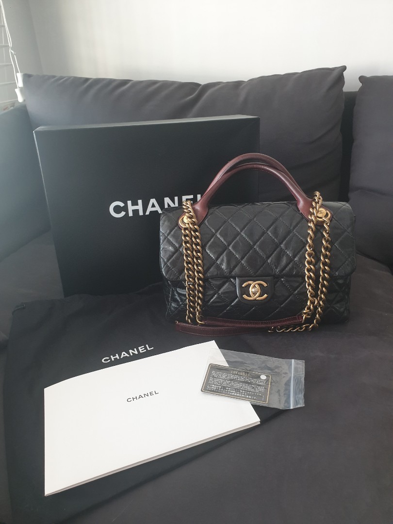 CHANEL Dark Beige Quilted Leather Castle Rock Bowling Bag