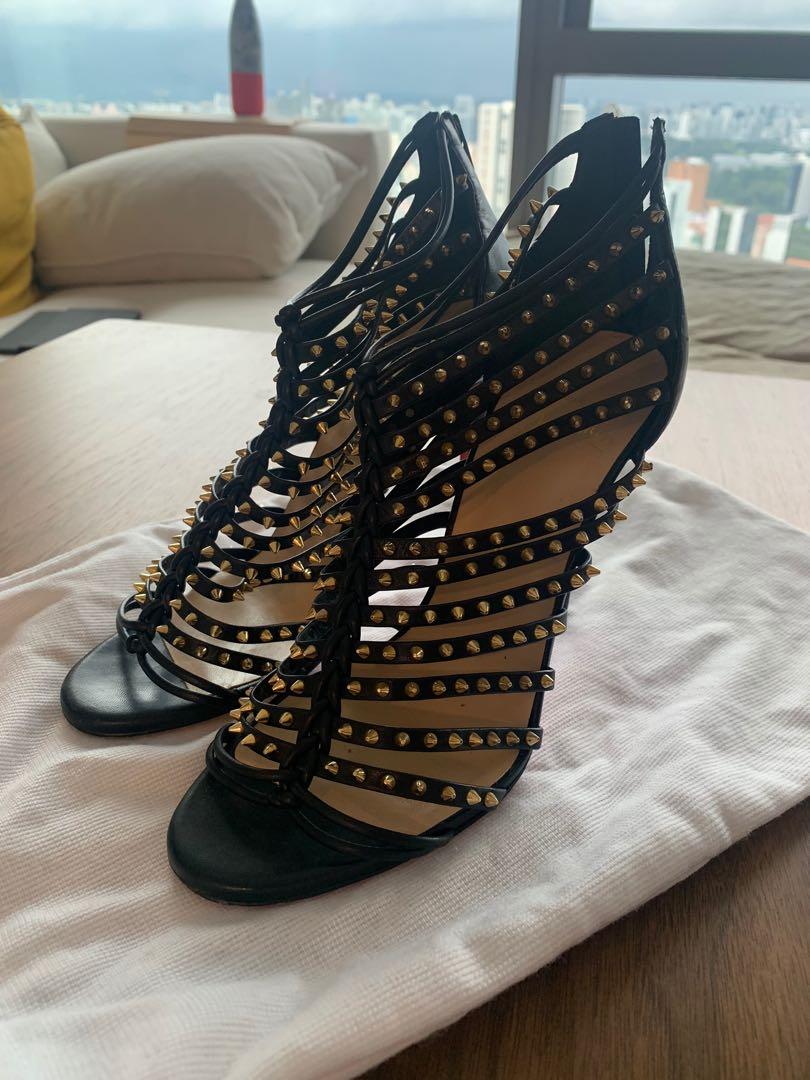 black heels with gold spikes