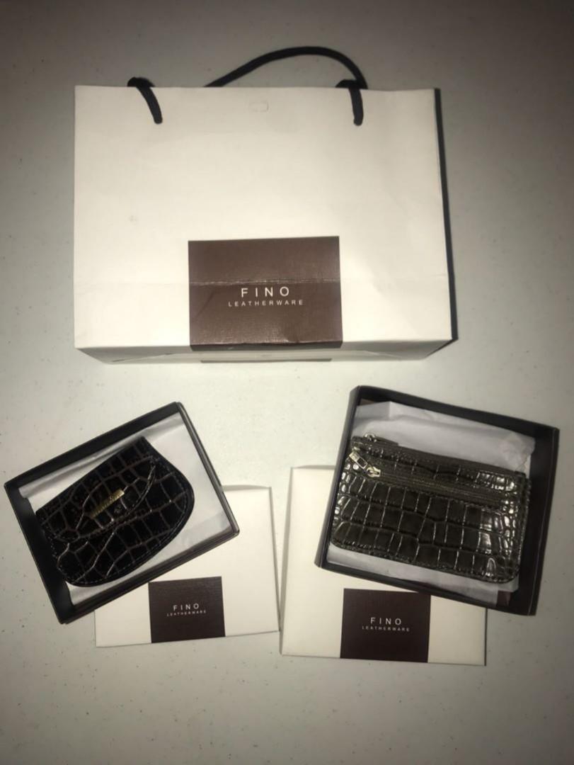 Fino Leather Coin Purse (Category: Luxury Bags & Wallets) located in Quezon City. Submitted by tina.0427 (Listing ID 1018328749, Image 1). Description: Genuine leather. brandnew, never used. 800each, get both for 1500..