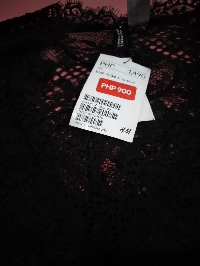 H&M Black Lace Dress (Category: Dresses) located in Makati City. Submitted by mimmyche (Listing ID 1018464570, Image 3). Description: This gorgeous H&M black lace dress is sexily sophisticated for any formal event. Beautiful lace patterned design with scalloped borders on v neck and on skirt hem. Polyester blend with spandex fit, Fully lined and long sleeve coverage, fitted waist is 12", hips are 13.5". From waist line to bottom hem is 17", shoul