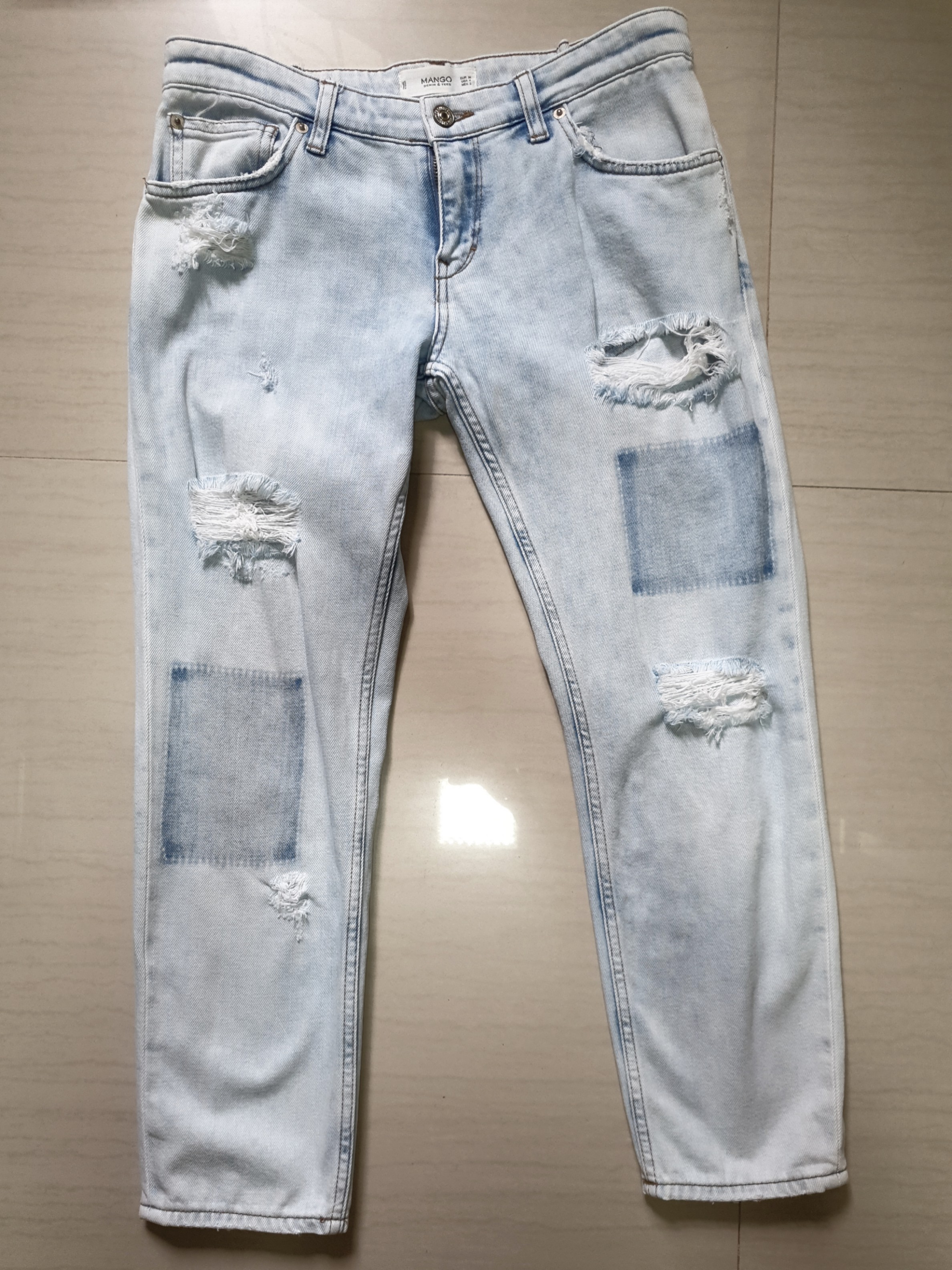 light wash denim ripped jeans