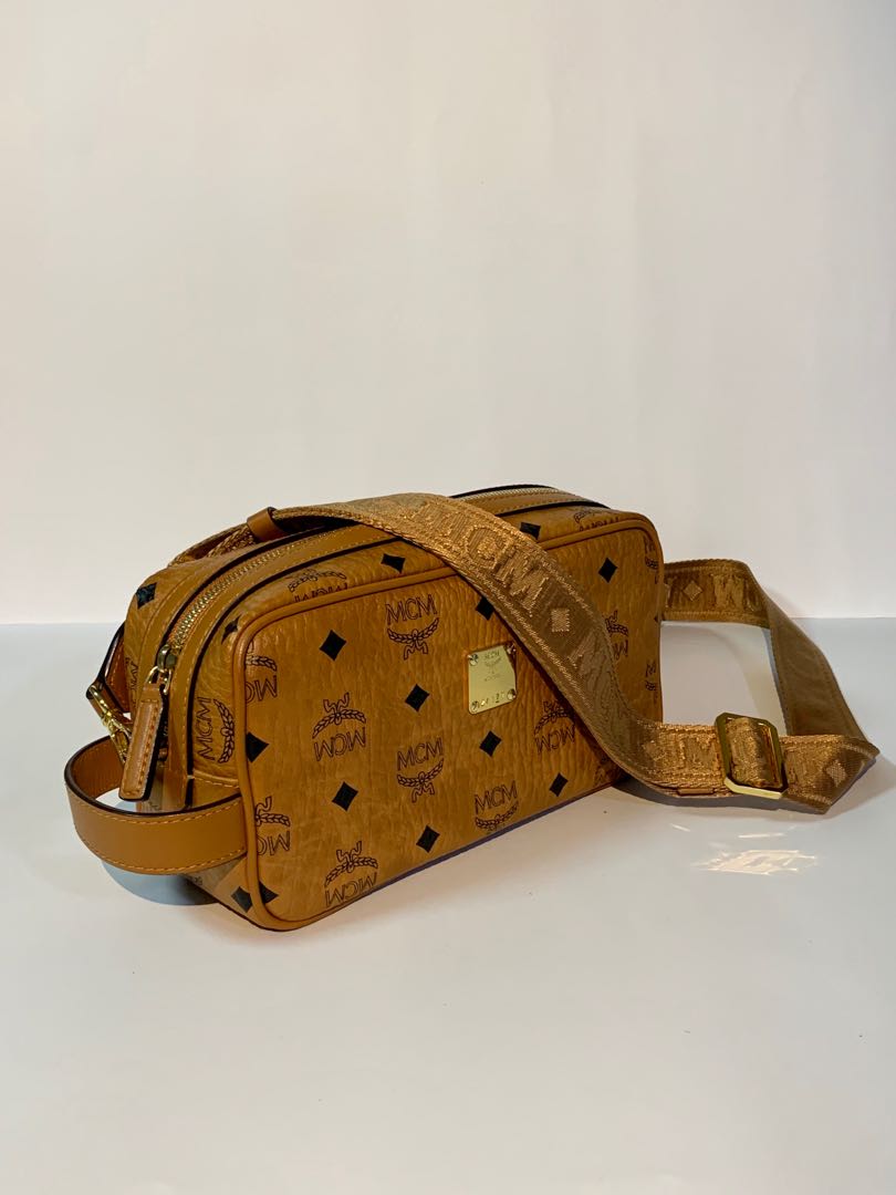 MCM sling wash bag in Visetos Cognac Luxury Bags Wallets on