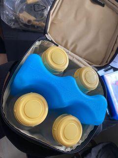 Medela carry-on ice pack with 4 bottles