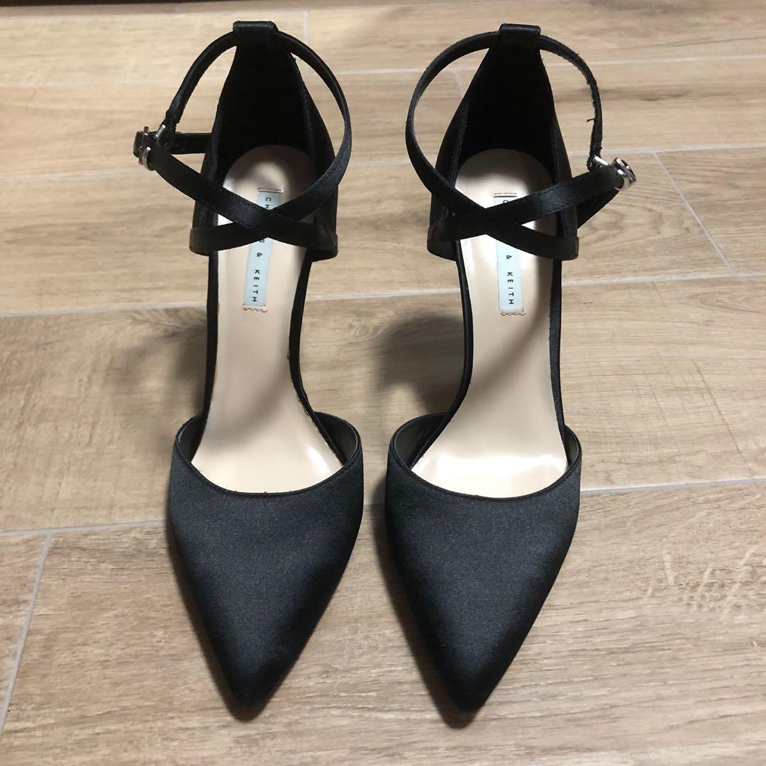 black satin pointed toe pumps