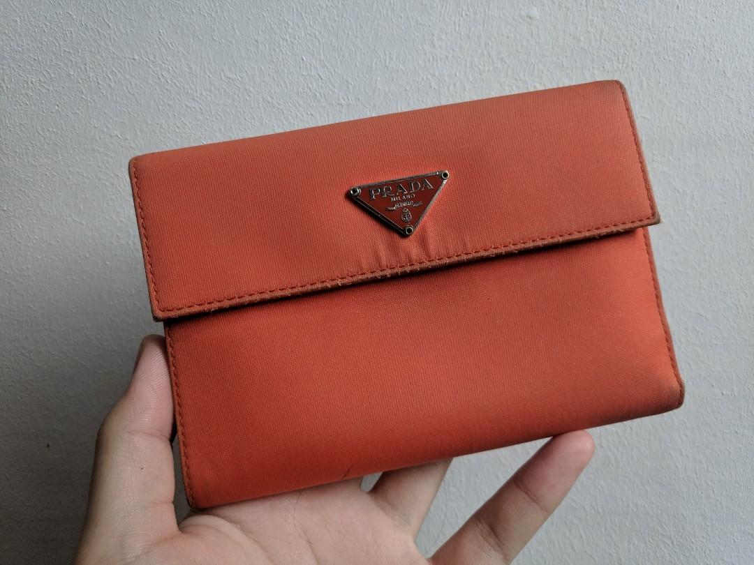 Orange new arrivals prada wallet