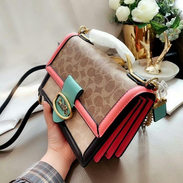 Coach riley top handle store 22 in signature canvas
