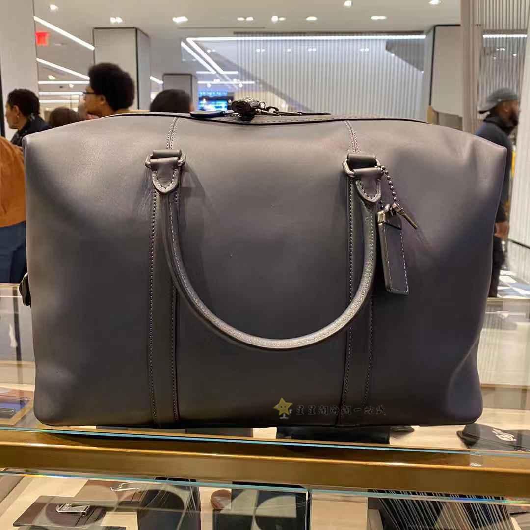 coach mens carry on luggage