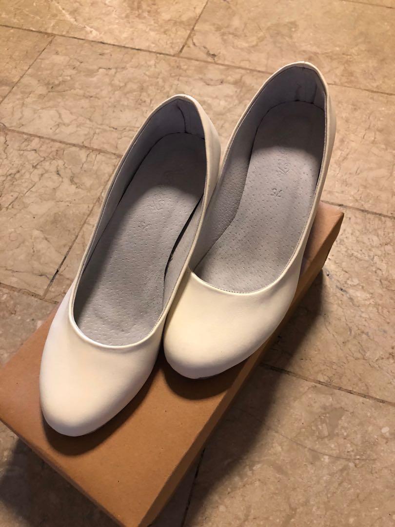 plain white high heels