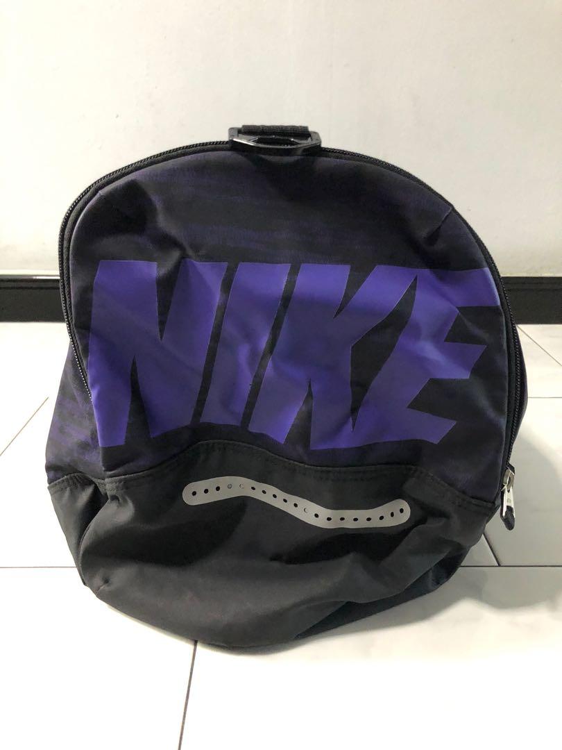 purple and black nike backpack