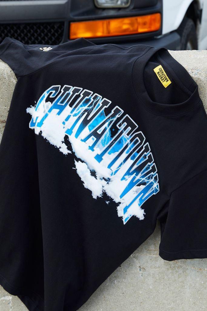 size L: chinatown market storm arch tee, Men's Fashion, Tops \u0026 Sets, Tshirts  \u0026 Polo Shirts on Carousell