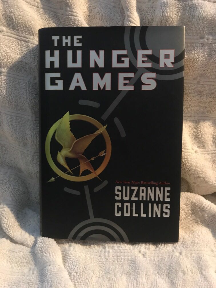 The Hunger Games Suzanne Collins Hardbound Books Books On Carousell