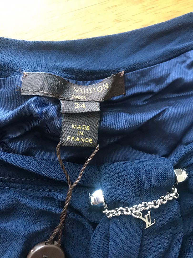 Louis Vuitton LV Blue Blouse Top (Category: Luxury Apparel) located in Manila. Submitted by rippedjeans (Listing ID 1019005025, Image 3). Description: Guaranteed authentic, bought on sale also in HK many years back. Nice top, with silk lining inside. Never got around to wearing it. Unfortunately there’s a small nick in the collar, pLs see pics Still with tags. Needs washing, Please do it yourself if I do it I would need to remove the tags ✌🏽 BPI
