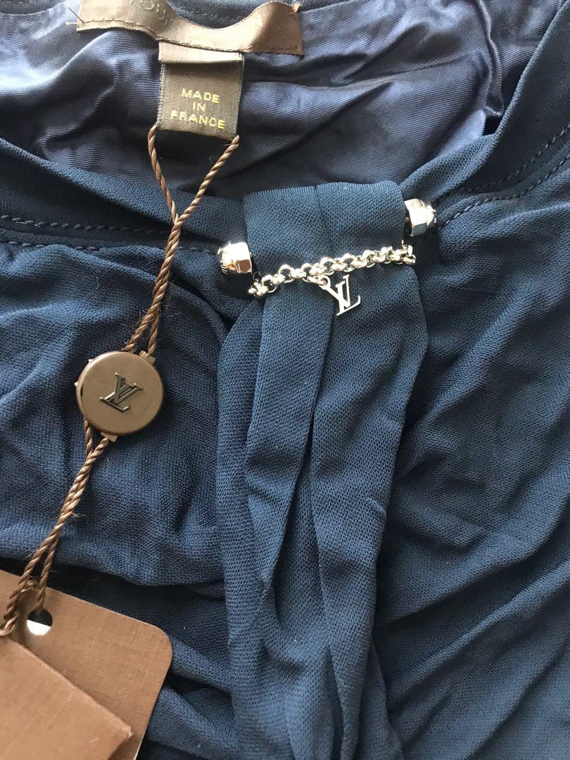 Louis Vuitton LV Blue Blouse Top (Category: Luxury Apparel) located in Manila. Submitted by rippedjeans (Listing ID 1019005025, Image 2). Description: Guaranteed authentic, bought on sale also in HK many years back. Nice top, with silk lining inside. Never got around to wearing it. Unfortunately there’s a small nick in the collar, pLs see pics Still with tags. Needs washing, Please do it yourself if I do it I would need to remove the tags ✌🏽 BPI