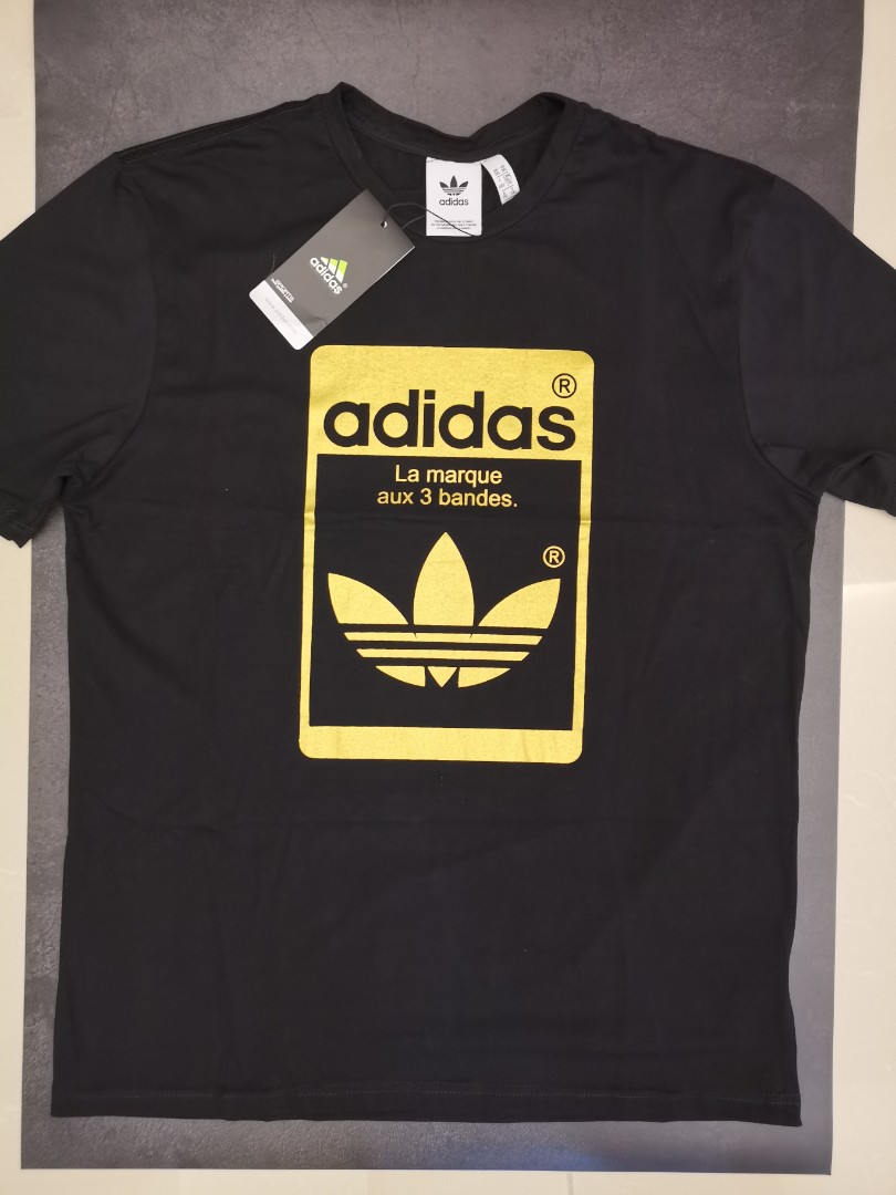 gold adidas shirt